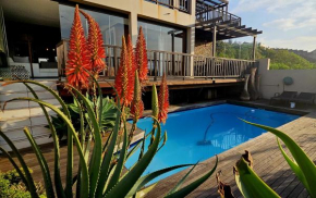 4 Dolphin Views La Mercy Luxury Beachfront Apartment with Private Swimming Pool